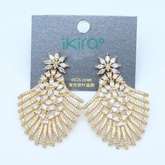 ikira_jewelry_earrings_white_flower_and_wing_shaped_drop_earrings_gold_2