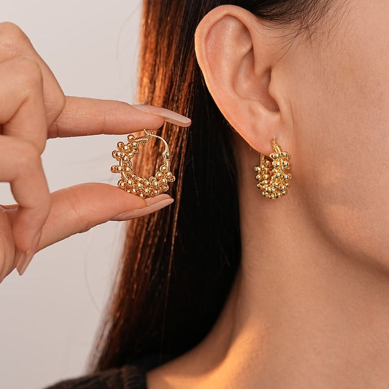 Metallic round bead U-shaped earrings