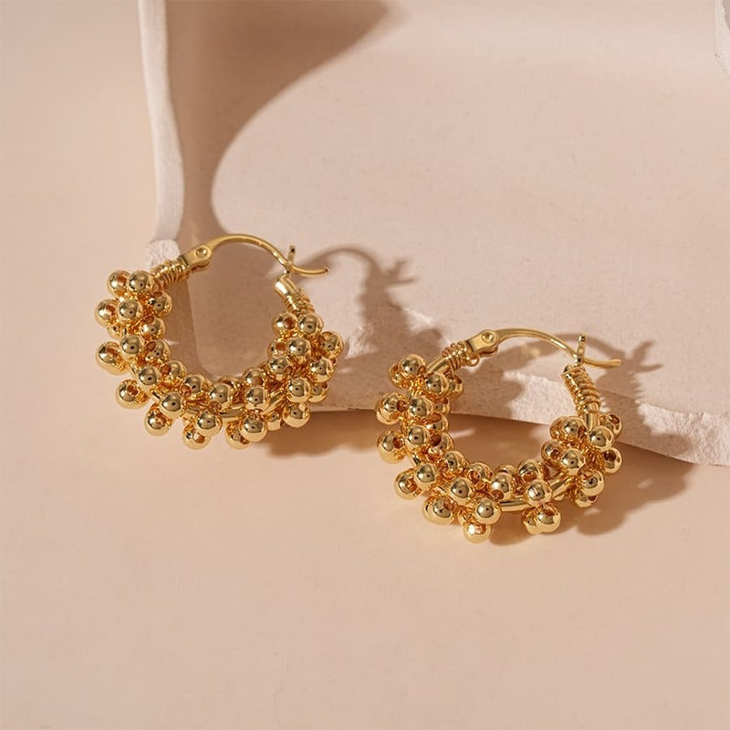 Metallic round bead U-shaped earrings